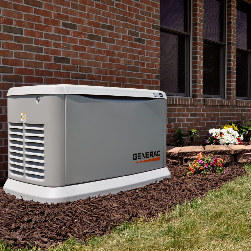 Standby generator installed beside a home